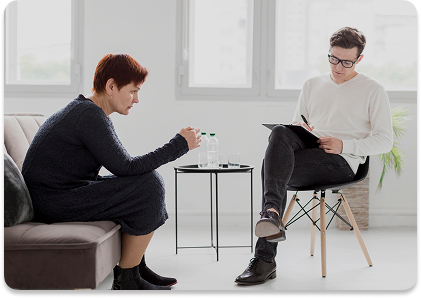 A care professional speaking with a client